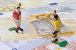 Figures of football players on banknotes
